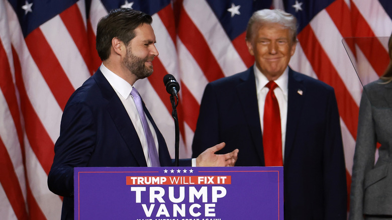 JD Vance and Donald Trump smiling onstage