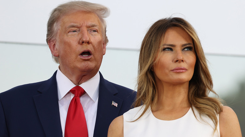 Donald Trump pen-mouthed behind Melania Trump