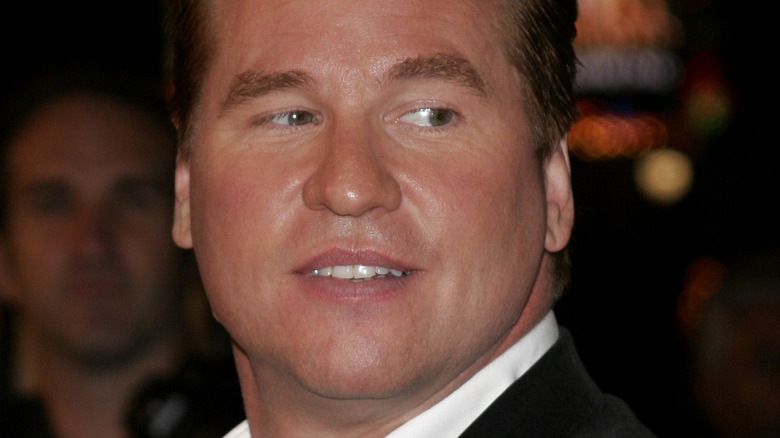 Val Kilmer on the red carpet looking to the side