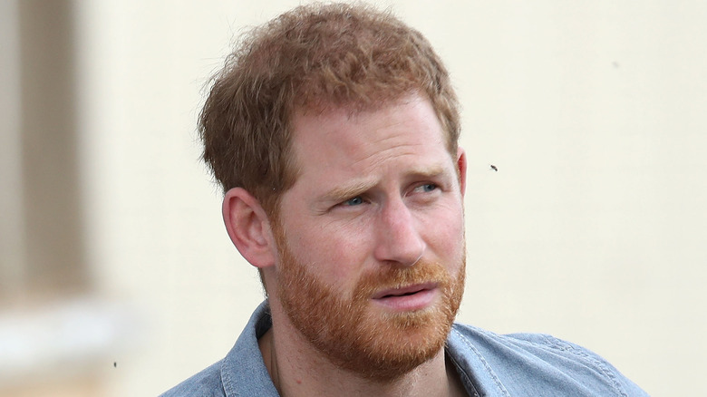 Prince Harry with a serious expression