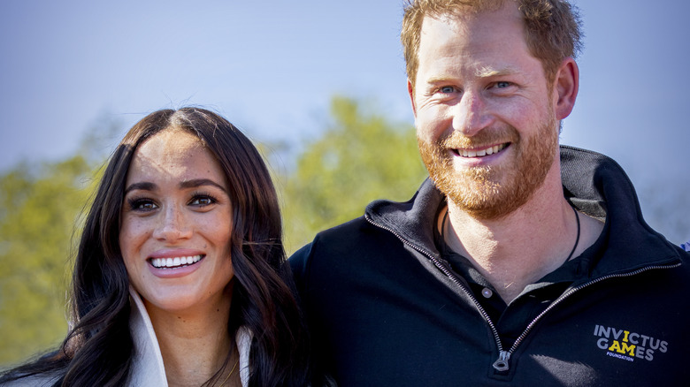 Prince Harry and Meghan Markle posing