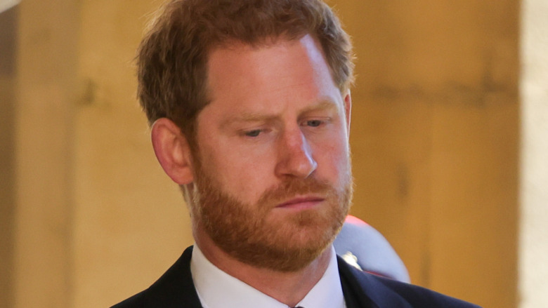 Prince Harry frowning