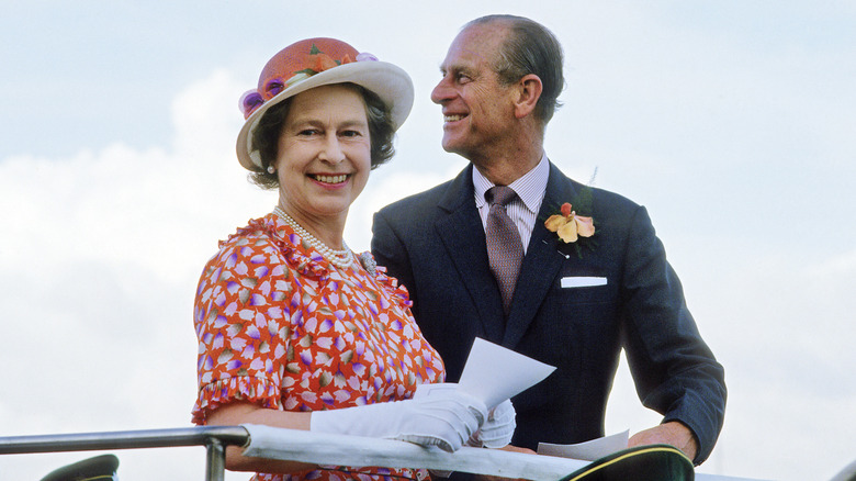 Elizabeth II flower dress Prince Philip smiling