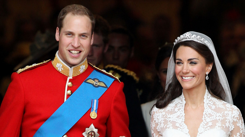 Prince William and Kate Middleton smiling on wedding day