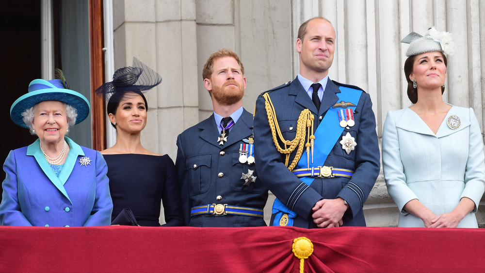 Queen Elizabeth, Meghan Markle, Prince Harry, Prince William, and Kate Middleton at royal event