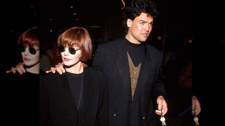 Priscilla Presley and Marco Garibaldi walking