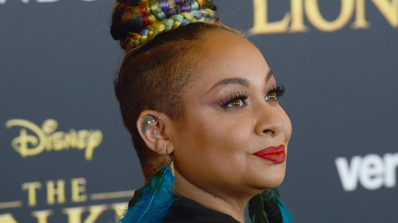 Raven-Symoné looking up at a Disney premiere