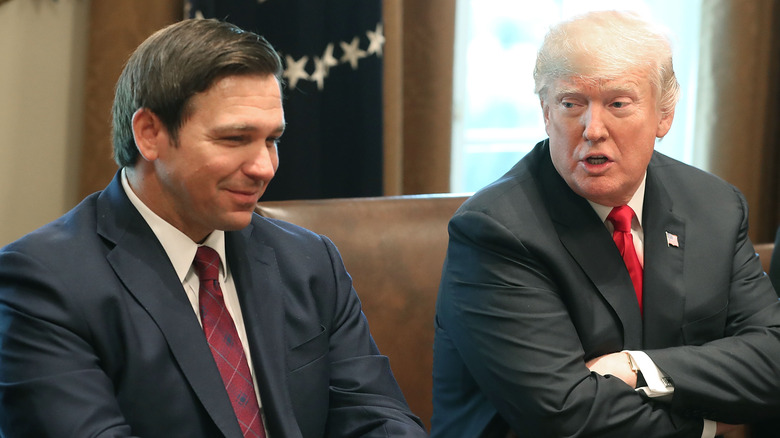 Ron DeSantis smiling Donald Trump