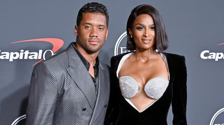 Russell Wilson and Ciara at an event