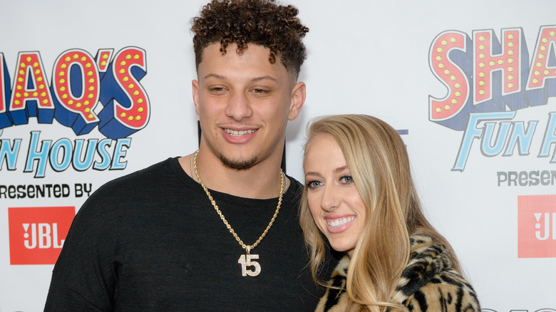 Brittany and Patrick Mahomes posing together