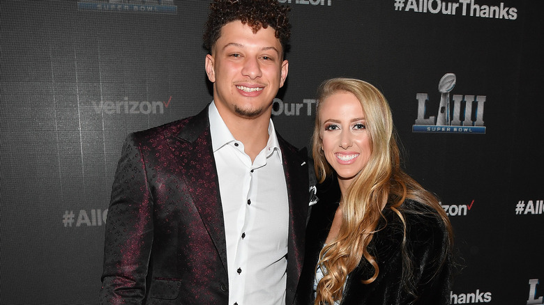 Brittany and Patrick Mahomes posing together