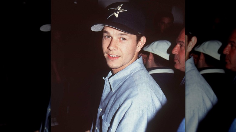 Young Mark Wahlberg wearing hat