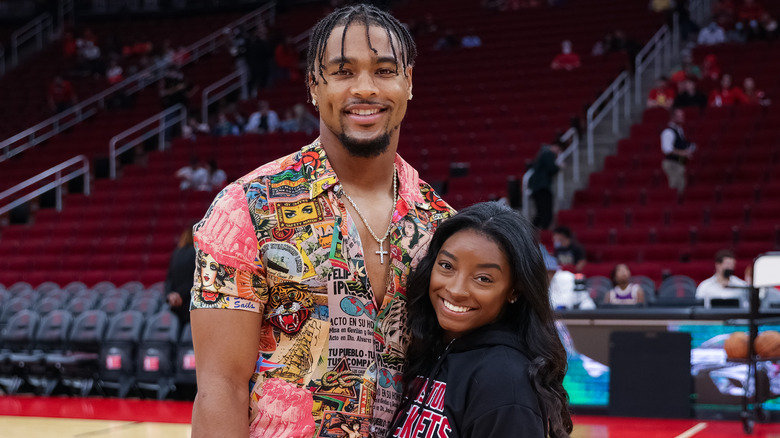 Jonathan Owens Simone Biles posing