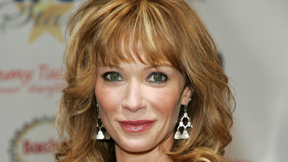 Lauren Holly smiling