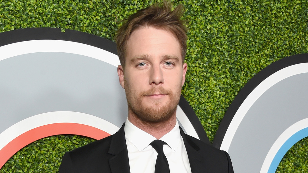 Jake McDorman smirking 