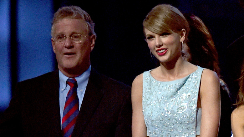 Scott Swift and Taylor Swift onstage 