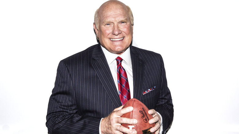 Terry Bradshaw holding a football