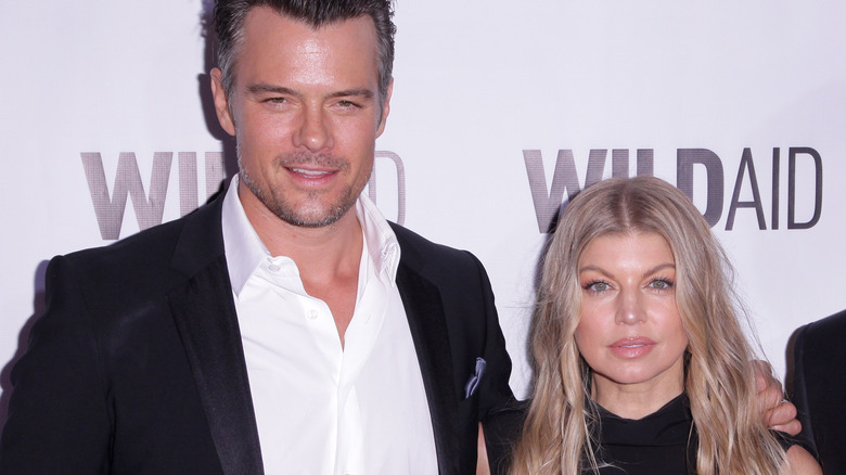 Josh Duhamel and Fergie smiling