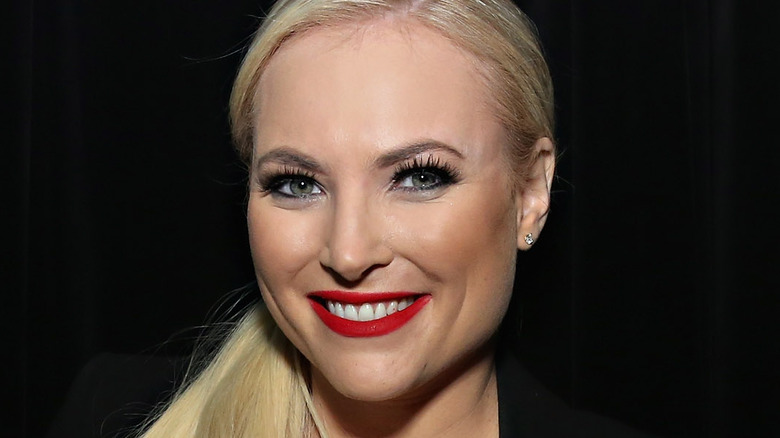 Meghan McCain smiling with award