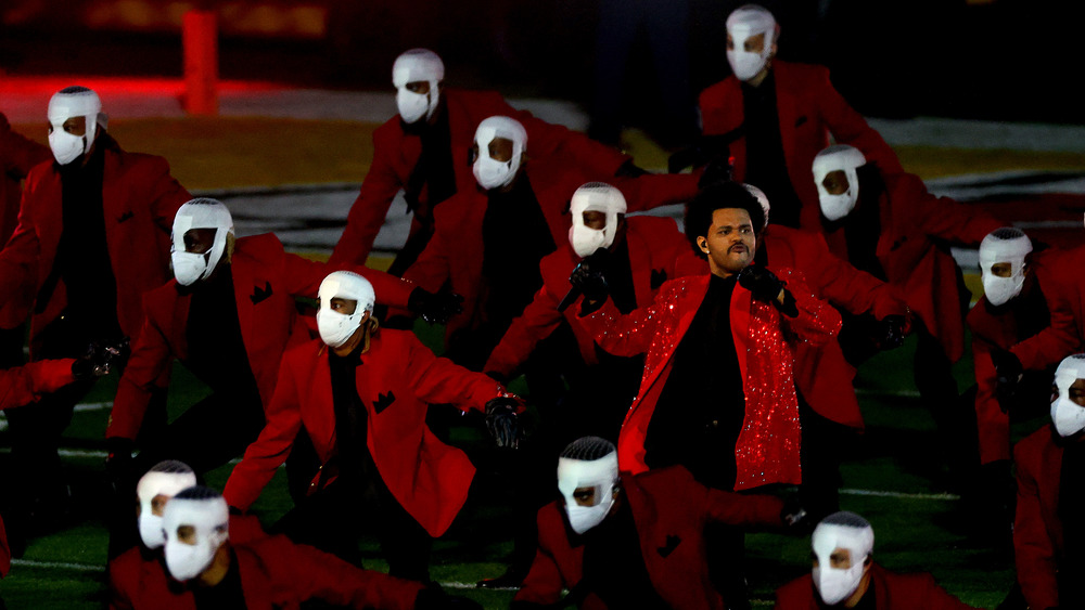 The Weeknd and his backup dancers wearing rad jackets during the Super Bowl halftime show