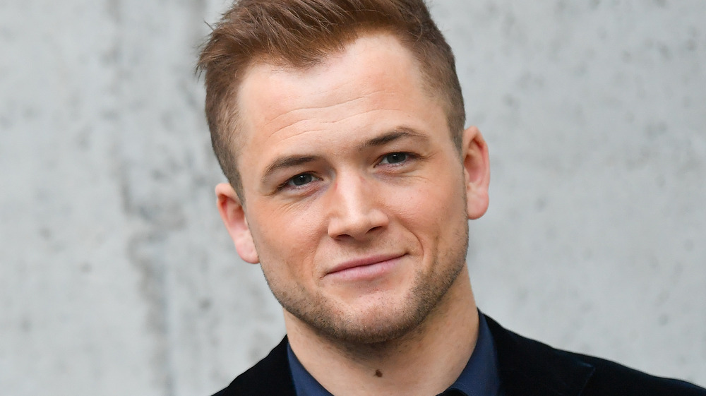 Taron Egerton smiling 