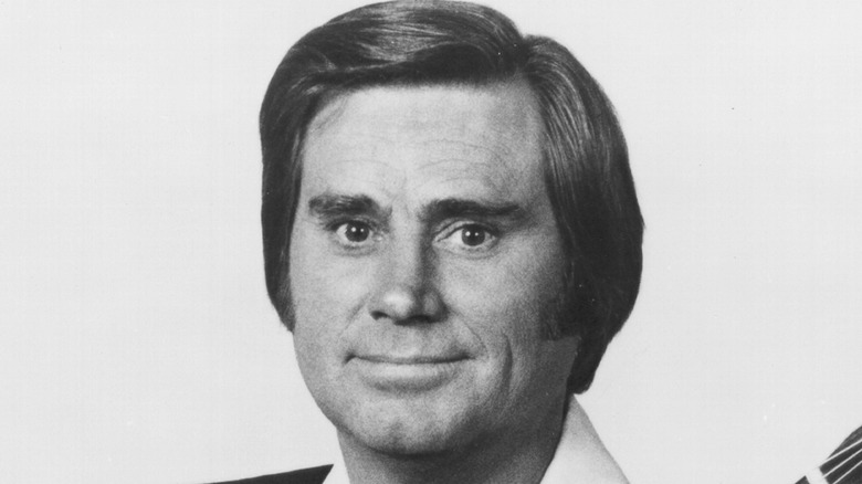 George Jones posing for a photo