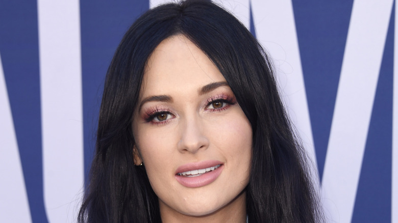 Kacey Musgraves posing at an event