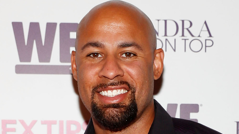 Hank Baskett smiling