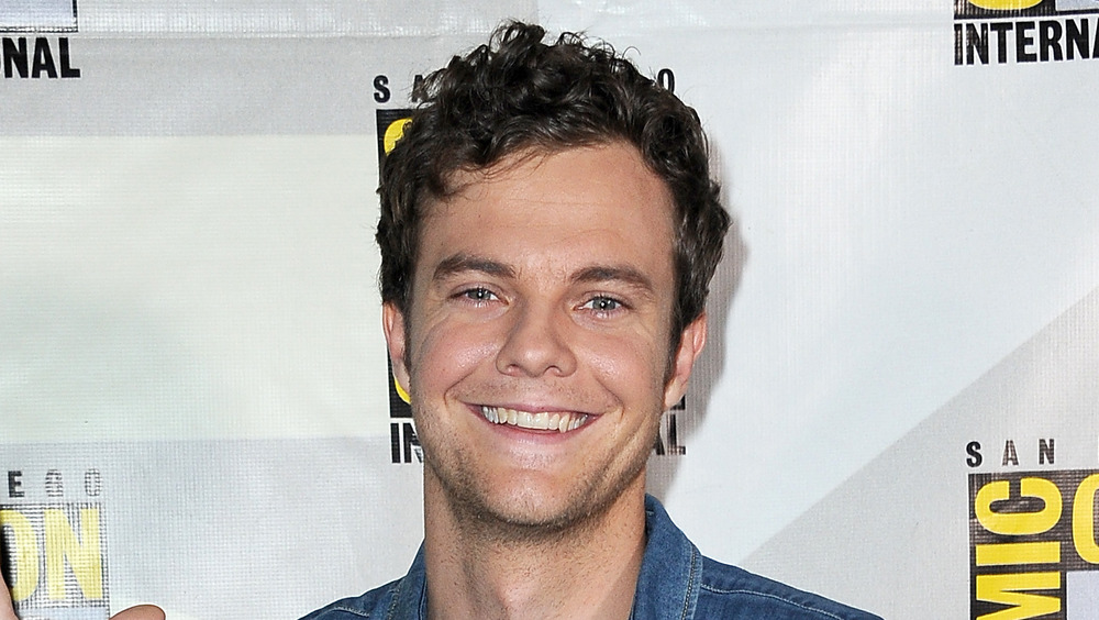 Jack Quaid smiling