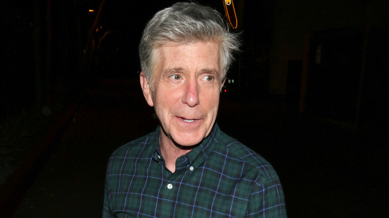 Tom Bergeron walking down the street