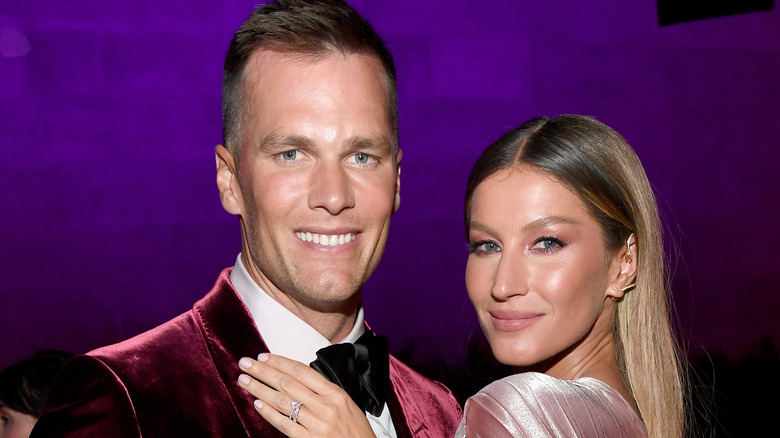 Tom Brady and Gisele Bündchen posing