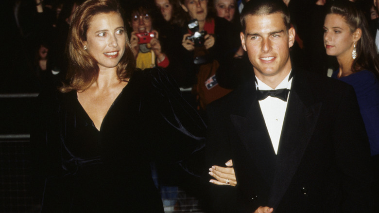 Tom Cruise and Mimi Rogers smiling