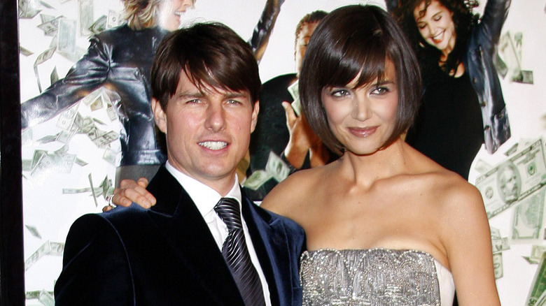 Tom Cruise posing with Katie Holmes