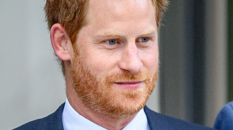 Prince Harry looking downward at the One World Observatory 