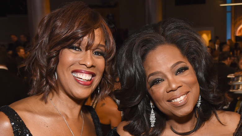 Gayle King poses for a picture with Oprah Winfrey