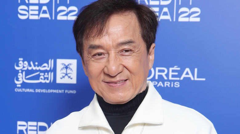 Jackie Chan posing for cameras