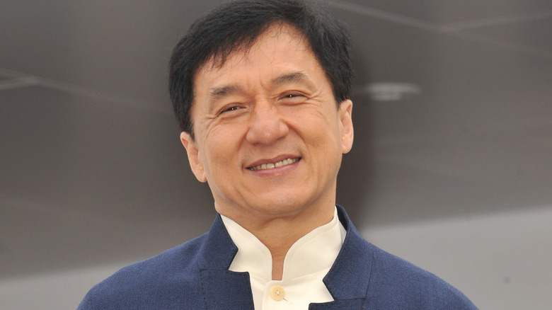 Jackie Chan posing for cameras