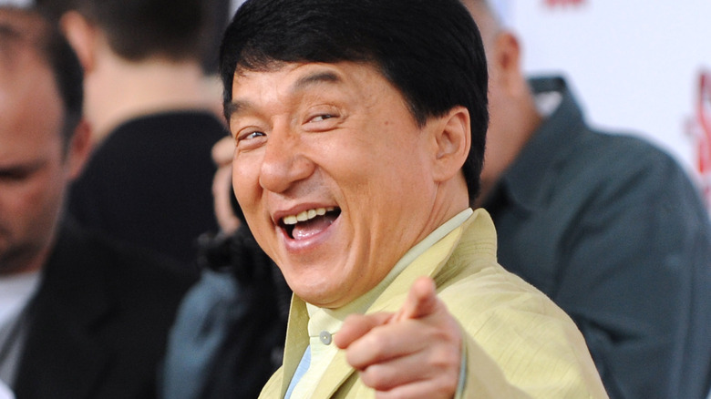 Jackie Chan posing on red carpet