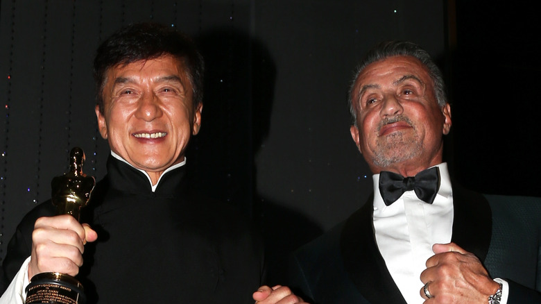 Jackie Chan and Sylvester Stallone posing