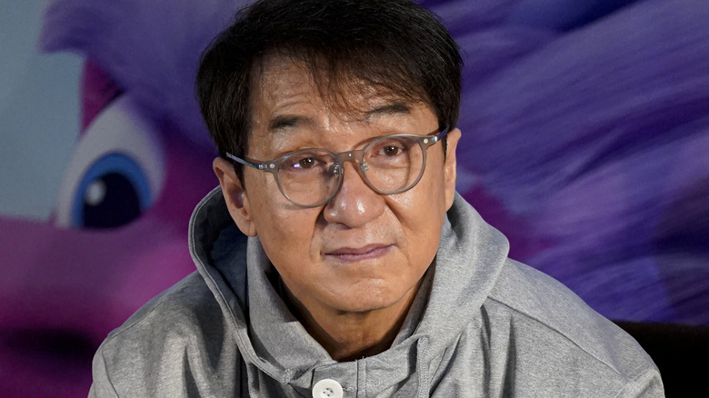 Jackie Chan posing for cameras