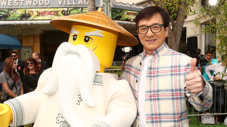 Jackie Chan posing at movie premiere