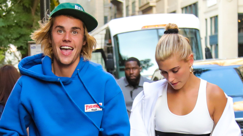 Justin Bieber happy face, Hailey Bieber head down