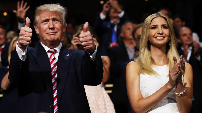 Donald Trump thumbs up, Ivanka Trump clapping