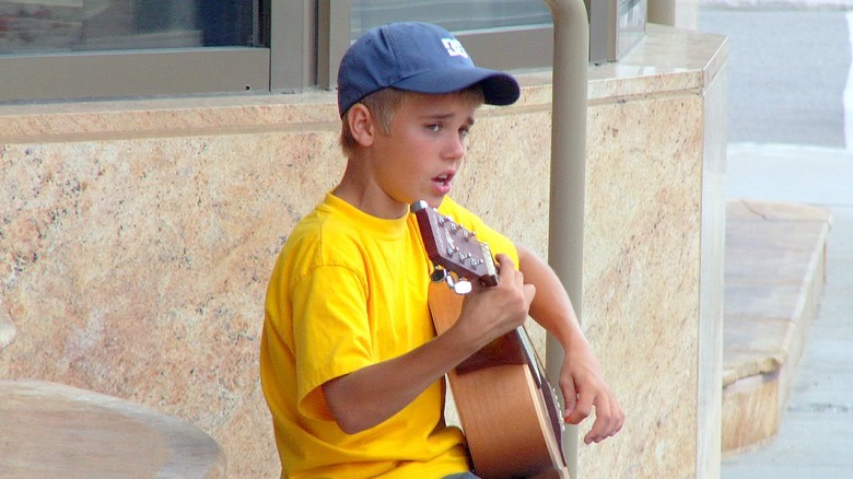 Justin Bieber performing on the street