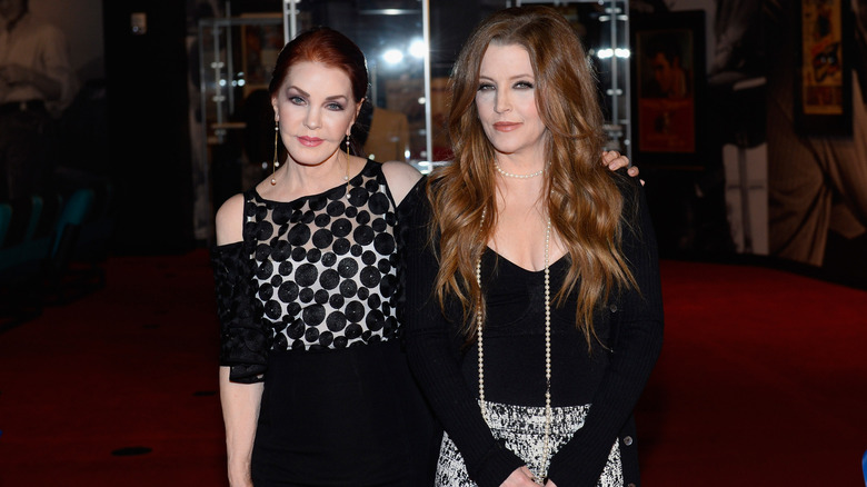 Priscilla Presley and Lisa Marie Presley at ribbon cutting