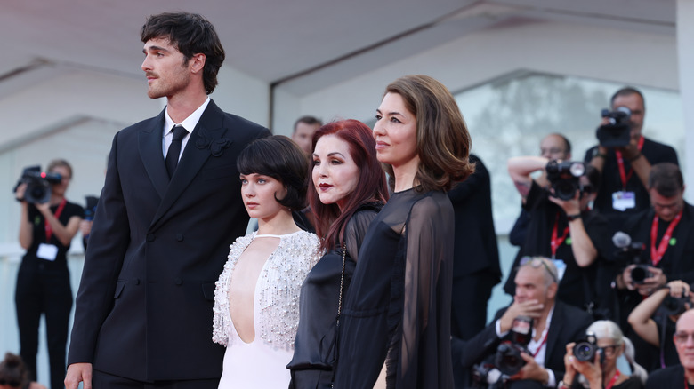 Jacob Elordi, Cailee Spaeny, Priscilla Presley and Sofia Coppola posing