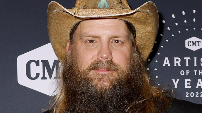 Chris Stapleton looking toward camera