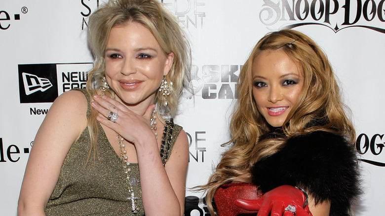 Casey Johnson and Tila Tequila pose together at an album release party