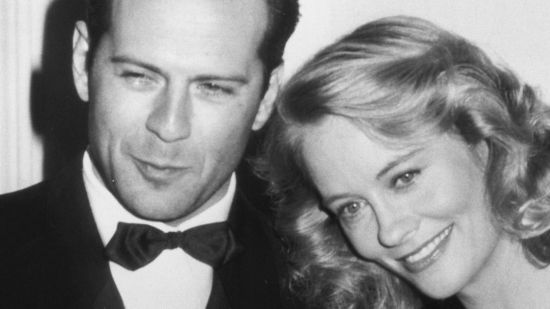 Bruce Willis and Cybill Shepherd posing