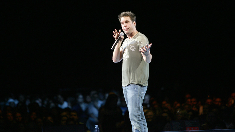 Dane Cook performs with mic